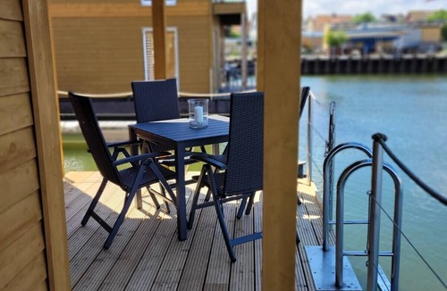 Ostvorpommern Boat Rental | Boat 'Floating House' with Lake View, Private Terrace and Wi-Fi