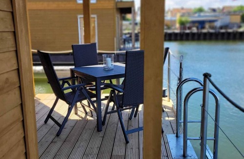 Kroeslin Boat Rental | Boat 'Floating House' with Lake View, Private Terrace and Wi-Fi