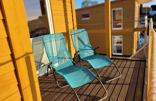 Kroeslin Boat Rental | Boat 'Floating House' with Lake View, Private Terrace and Wi-Fi