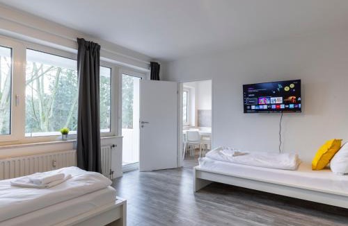 Rentfort-Nord Apartment | BudgetRoom Modernes Apartment mit 3 Schlafzimmern