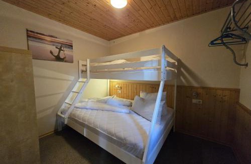 Bakenberg Apartment | Bungalow RUHE UND STURM direkt am STRAND mit KAMIN nur für ERWACHSENE