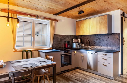 Farchant Ski Chalet | Chalet Rauschn with mountain view with whirlpool, shared sauna, terrace, balcony.