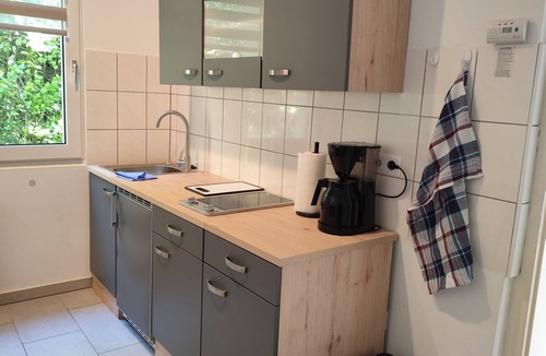 Hagen Apartment | Charming house within a house - vacation & business apartment with private terrace.