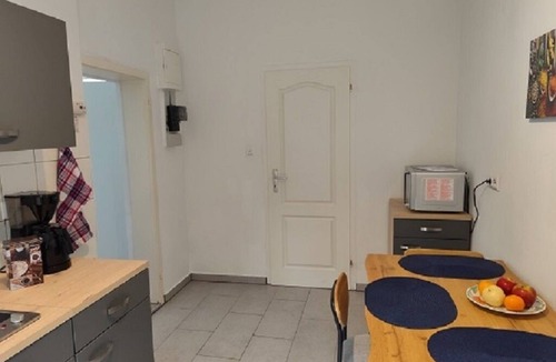 Hagen Apartment | Charming house within a house - vacation & business apartment with private terrace.