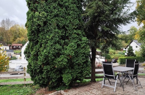 Hagen Apartment | Charming house within a house - vacation & business apartment with private terrace.