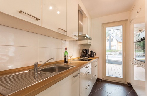 Ostseebad Baabe Apartment | Child-friendly vacation rental "Strandvilla Baabe 15" in Baabe. An inviting terrace for relaxing breakfasts. Soothing relaxation in the sauna for a restful vacation. Utilities included