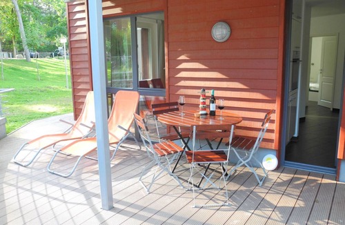 Ostseebad Baabe Apartment | Child-friendly vacation rental "Strandvilla Baabe 15" in Baabe. An inviting terrace for relaxing breakfasts. Soothing relaxation in the sauna for a restful vacation. Utilities included