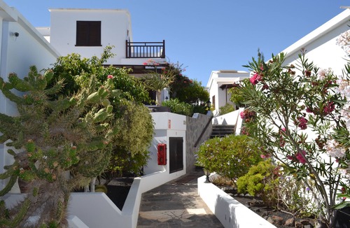Playa Honda House | Comfort bungalow (1st row) in exclusive complex directly by the sea/beach pool