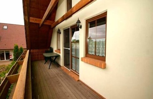 Warthe Apartment | Comfortable apartment with balcony, lake view & family-friendly furnishings