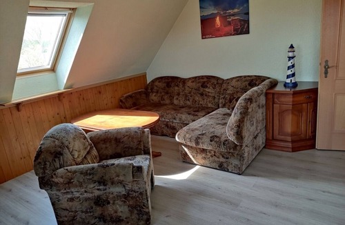 Warthe Apartment | Comfortable apartment with balcony, lake view & family-friendly furnishings