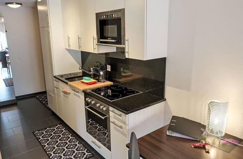 Leukerbad Apartment | Cosy apartment for 2 guests with WIFI, hot tub, TV and terrace