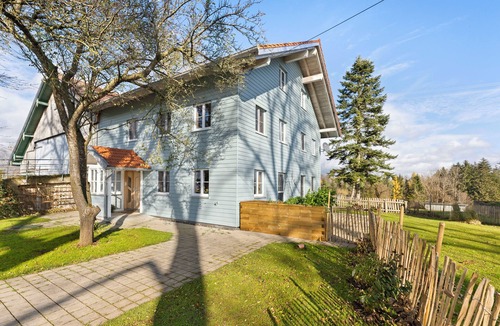 Altusried Apartment | Country magic Allgäu. Idyllic Scandinavian-style apartment surrounded by nature.