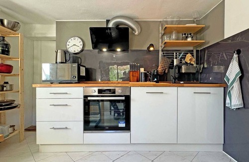 Furstenfeldbruck District House | Cozy Bavarian home with fireplace and fully equipped kitchen.