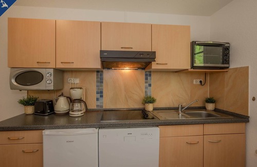 Korswandt Apartment | Cozy holiday bungalow in a quiet forest location, 800 m from the Wolgastsee.