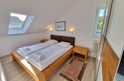 Binz Apartment | Dünenpark Binz - Komfortplus Ferienwohnung mit 2 Schlafzimmern und Balkon im Dachgeschoss 047