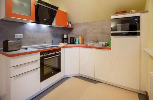 Binz Apartment | Dünenpark Binz - Komfortplus Ferienwohnung mit 2 Schlafzimmern und Balkon im Dachgeschoss 048