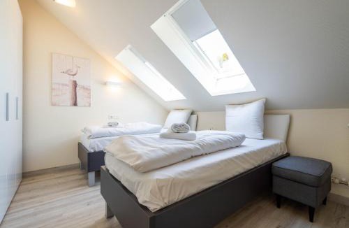 Binz Apartment | Dünenpark Binz - Komfortplus Ferienwohnung mit 2 Schlafzimmern und Balkon im Dachgeschoss 195
