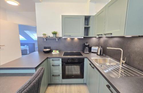 Binz Apartment | Dünenpark Binz - Komfortplus Ferienwohnung mit 2 Schlafzimmern und Balkon im Dachgeschoss 281