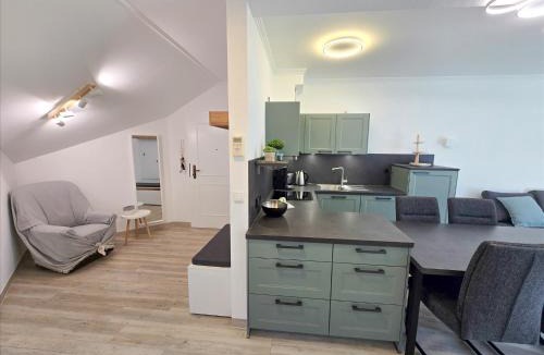 Binz Apartment | Dünenpark Binz - Komfortplus Ferienwohnung mit 2 Schlafzimmern und Balkon im Dachgeschoss 281