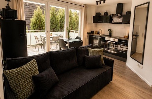 Titisee-Neustadt Apartment | Design Apartment 5 am Titisee mit Kamin, E-Ladestation, Balkon, Top Lage