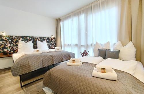 Mitte Apartment | Design-Apartmenthaus für bis zu 12, modern, Dachterrasse, Grill, ruhige Lage, Disney plus, Wii, LAN und WLAN