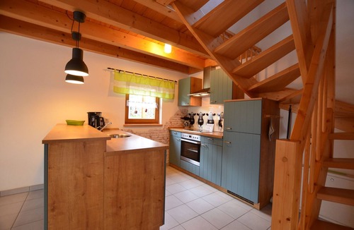 Lechbruck House | Detached vacation home with fireplace, balcony and garden in the Via Claudia vacation village