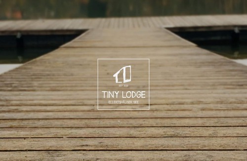 Stadtlauringen Apartment | Ecologically furnished tinylodge (25sqm) with sleeping lofts and terrace