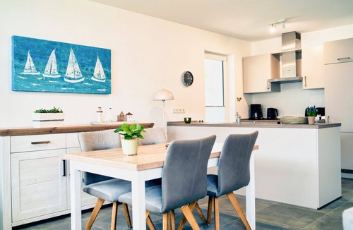 Nordhorn Apartment | Exclusive vacation apartment - Schilfhaus 96a in Nordhorn. Wellness vacation with sauna & whirlpool, family & dog friendly. With Smart TV & washing machine, even a waffle iron is available