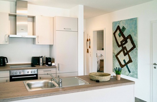 Nordhorn Apartment | Exclusive vacation apartment - Schilfhaus 96a in Nordhorn. Wellness vacation with sauna & whirlpool, family & dog friendly. With Smart TV & washing machine, even a waffle iron is available