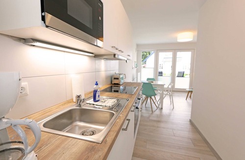 Monchgut-Granitz Apartment | F: House Windrose Whg 03 Beach oasis with terrace - House Windrose Whg 03