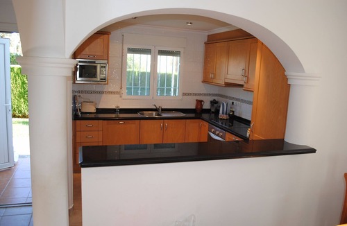 Denia House | Family sized Townhouse with Shared Pool. 5 minutes walk from beach and shops.