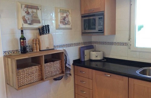 Denia House | Family sized Townhouse with Shared Pool. 5 minutes walk from beach and shops.
