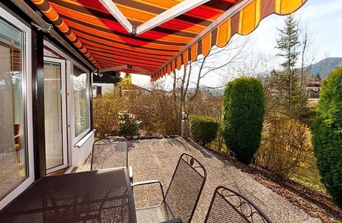 Schwarzenbach House | Ferienhaus 05-e mit Wintergarten und Südterrasse - Ferienhäuser im Feriendorf Weissensee im Allgäu