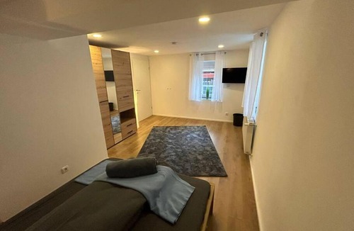 Altertheim Apartment | Ferienwohnung zur Fröhlichkeit