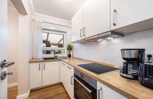 Bad Salzuflen Apartment | FewobyHD Ground Floor – 65 sqm with Conservatory, EV Charger & Pool