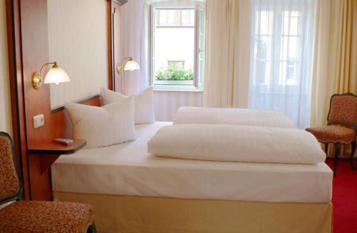 Schloßlein Hotel | Gästehaus Plönlein - Hotel Goldener Hirsch Rothenburg