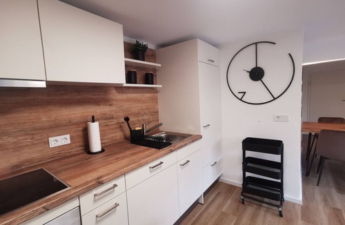 Malter Apartment | Garden view apartment with pool and children's playground