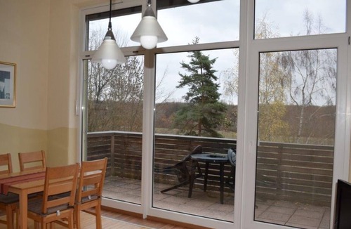 Bergrheinfeld Apartment | Gemütliche Ferienwohung (49qm) mit Balkon und Ausblick über Mainufer