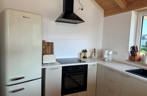 Worthsee Apartment | ღLIBORIA Idyllic roof terrace apartment with a view of Lake Wörth