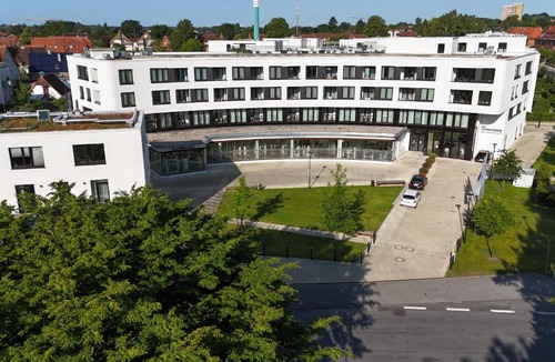 Alt-Travemunde/Ronnau Apartment | Godewindpark Exklusivsuite 3-09 mit Strandkorb am Strand