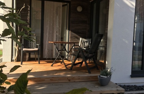 Bad Konigshofen Apartment | Ground-floor, disabled-friendly vacation apartment with small terrace, adjoining sunbathing lawn and lockable bicycle storage room