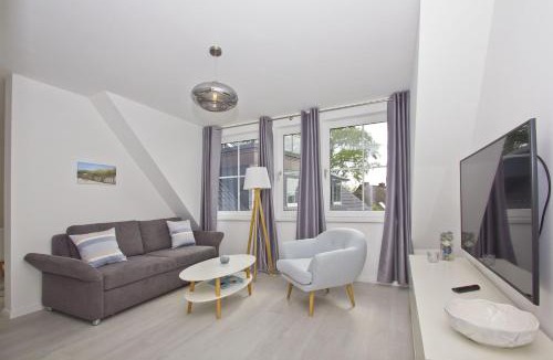 Gross Zicker Apartment | Haus Inselwind Ferienwohnung 19 MEERwellen mit gratis Nutzung vom AHOI Erlebnisbad und Sauna in Sellin