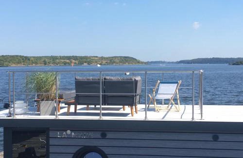 Schlutup Boat Rental | Hausboot Hafenprinz Lübeck