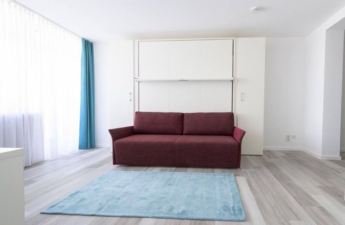 Furstenfeldbruck District Apartment | Holiday Apartment "Huber Living Deluxe 107" with Balcony & Wi-Fi