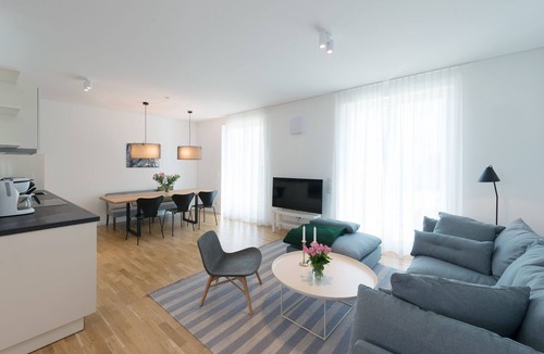 Binz Apartment | Holiday Apartment "Strandhaus Seeblick Binz 11" with Sea View, Private Garden and Wi-Fi