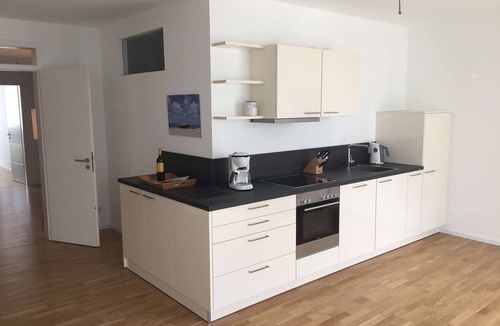 Binz Apartment | Holiday Apartment "Strandhaus Seeblick Binz 11" with Sea View, Private Garden and Wi-Fi