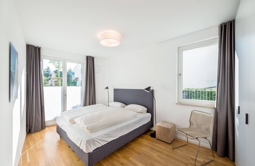 Binz Apartment | Holiday Apartment "Strandhaus Seeblick Binz 13" with Sea View, Private Terrace and Wi-Fi