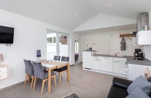 Schuettorf House | Holiday Home 'Haus 21 am See' with Large Grounds, Private Terrace, Garden & Wi-Fi