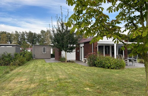 Schuettorf House | Holiday Home 'Haus 21 am See' with Large Grounds, Private Terrace, Garden & Wi-Fi
