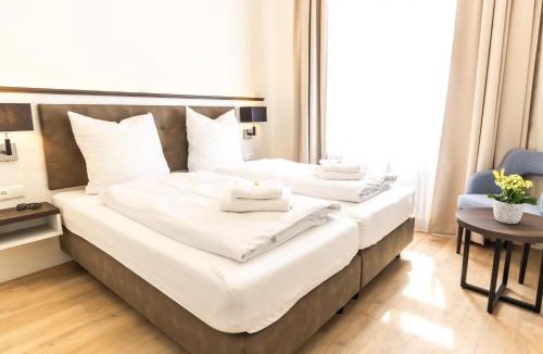 Ostseebad Kuhlungsborn Apartment | Hotel Haus am Meer Kühlungsborn in direkter Strandlage, Zimmer mit Meer- oder Gartenblick, teils Balkon & Frühstück zubuchbar in historischer Villa